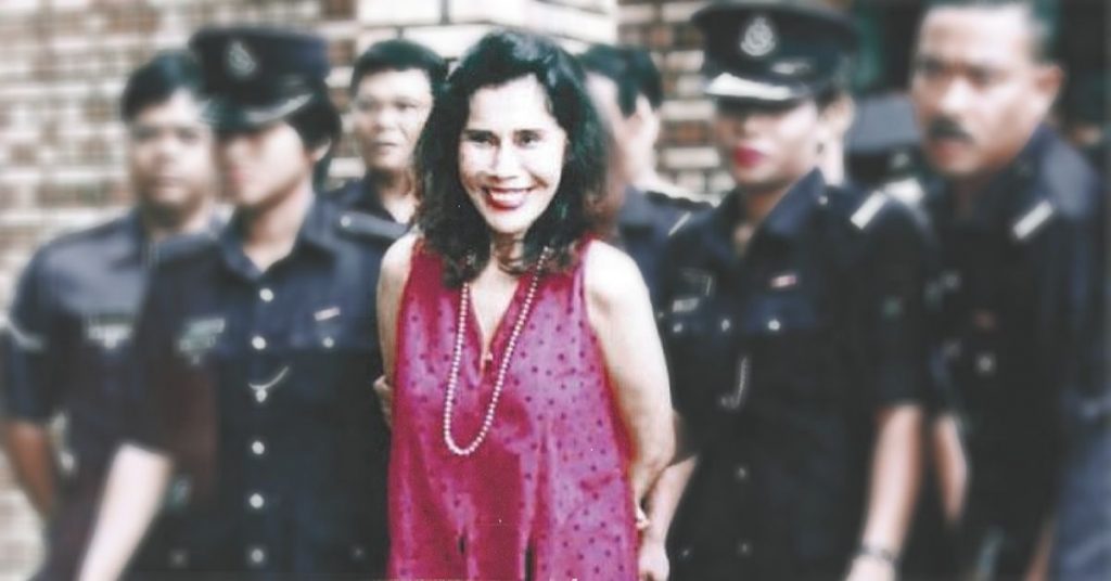 Mona Fandey smilling while got arrest