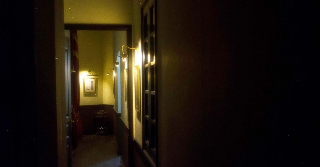 Hauntu hotel hallway that looks haunted